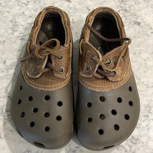 Crocs shoe like brown with leather ties. Size 7 womens